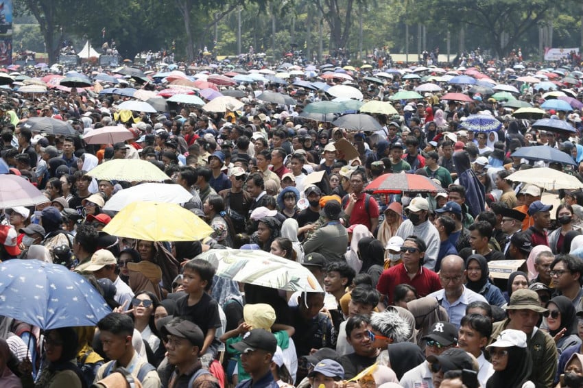Hadiri HUT ke-80 TNI di Monas, Warga: Alhamdulillah Ada Makanan Gratis